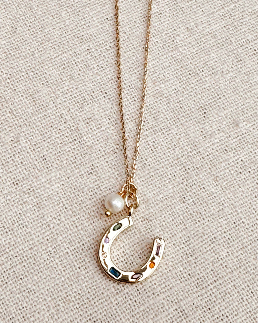 Gold Horseshoe Charm Necklace with Freshwater Pearl