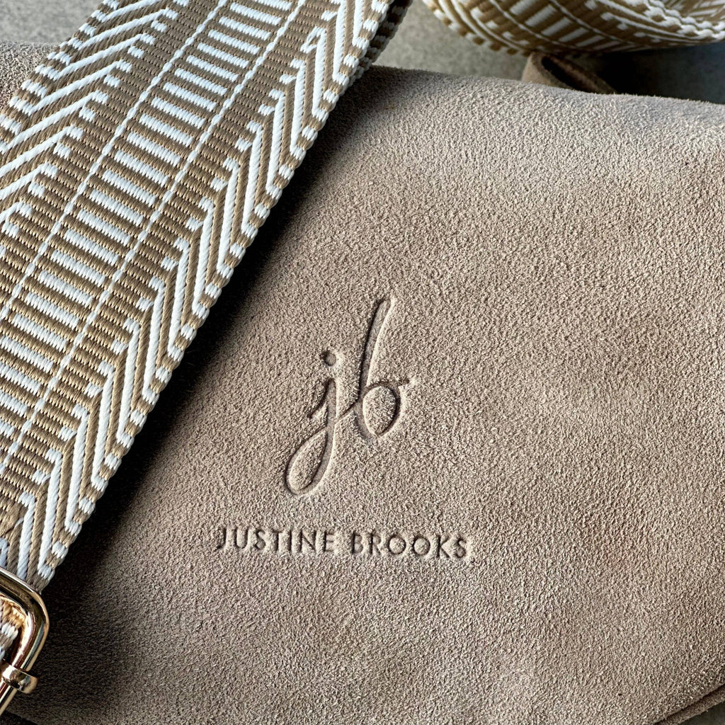 Suede bone crossbody bag