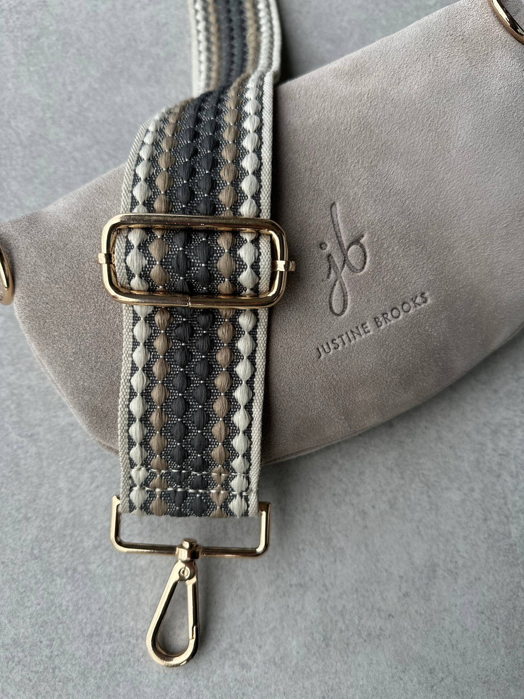 Suede bone crossbody bag