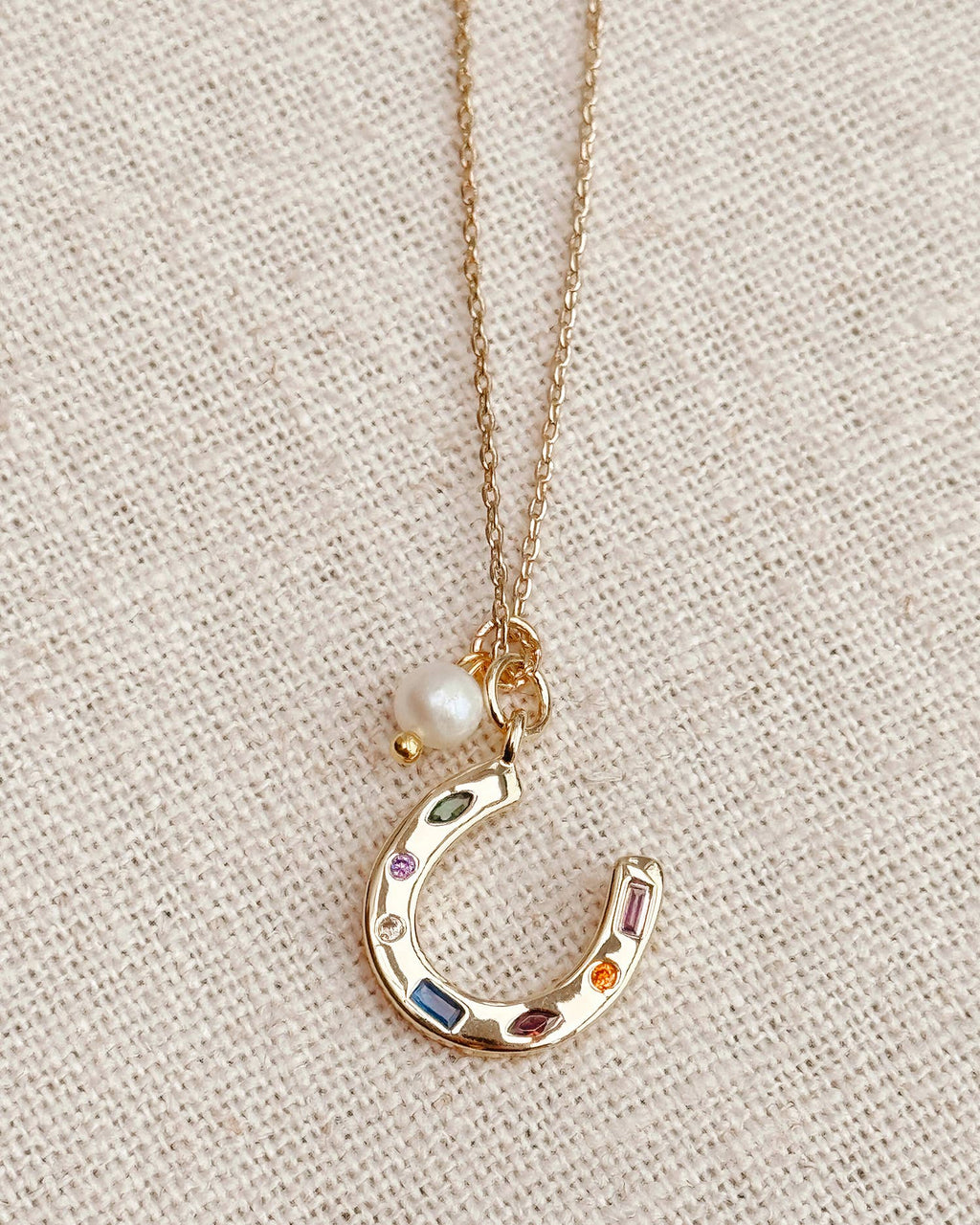 Gold Horseshoe Charm Necklace with Freshwater Pearl