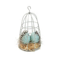 A23770: Wire caged eggs on straw bed, pale blue, 5 in