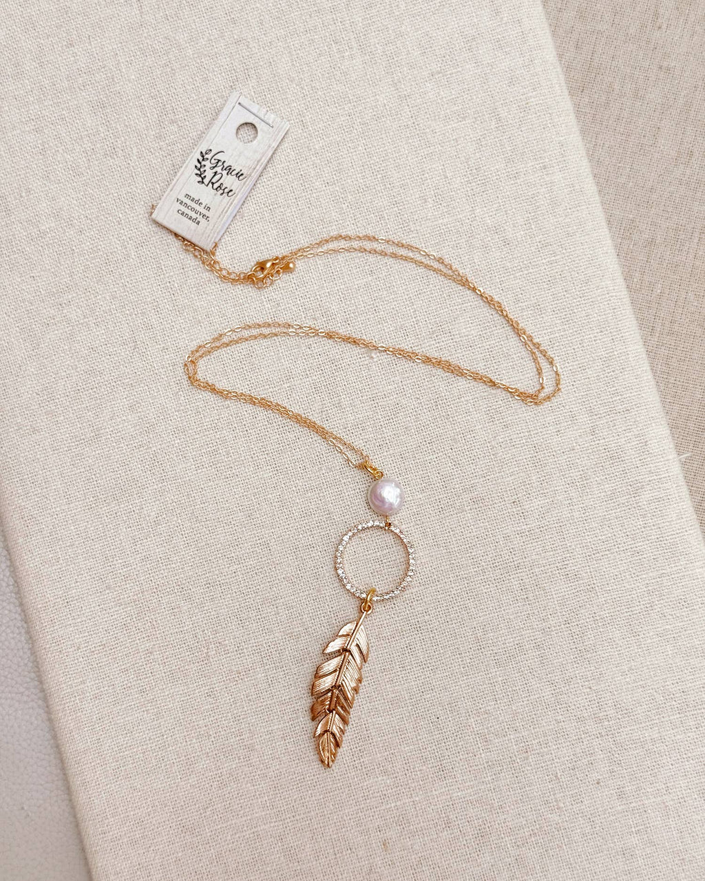 Pearl, Rhinestone Hoop & Feather Pendant Necklace: Silver